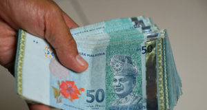 Новые ограничения наличных платежей в Малайзии могут повысить популярность биткойна