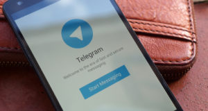 telegram, смартфон, портмоне