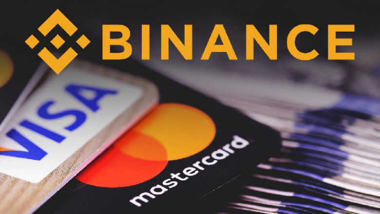 Visa и Mastercard не откажутся от работы с Binance из-за регуляторов Логотип Binance, карты Visa, Mastercard